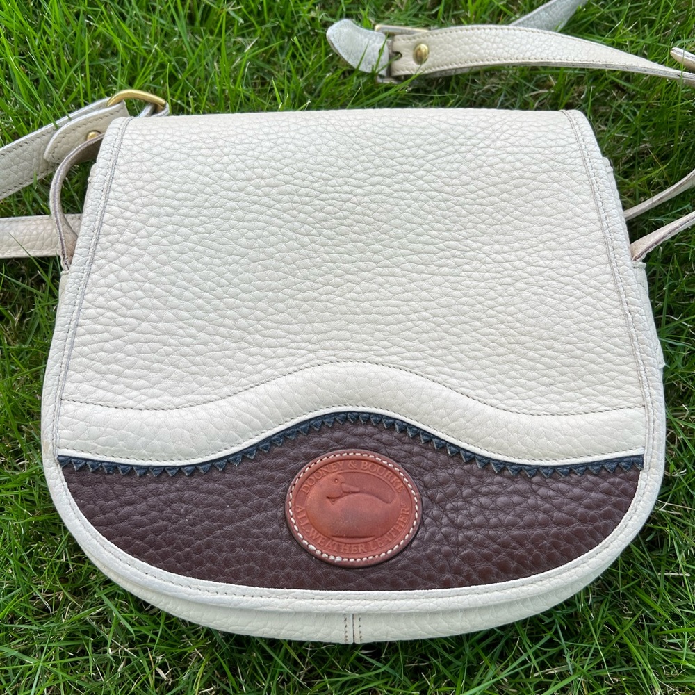 Vintage Dooney & Bourke Teton saddlebag in bone/brown/navy crossbody purse